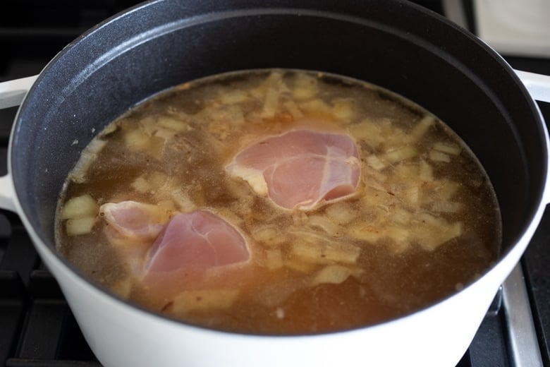 Place the chicken in the broth raw
