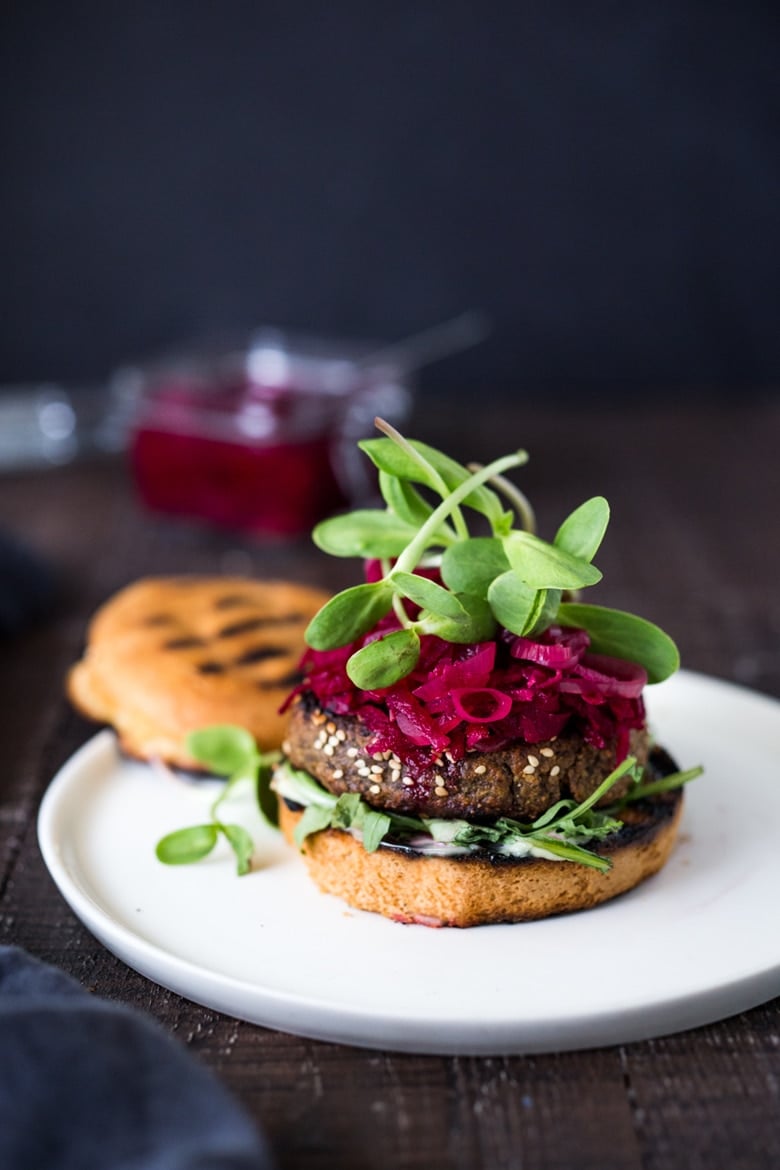 25 BEST Lentil Recipes! | Sprouted Lentil Burgars- GRILLABLE, vegan and gluten free adaptable. Topped with picked beets. | www.feastingathome.com #vegan #burger #grilled