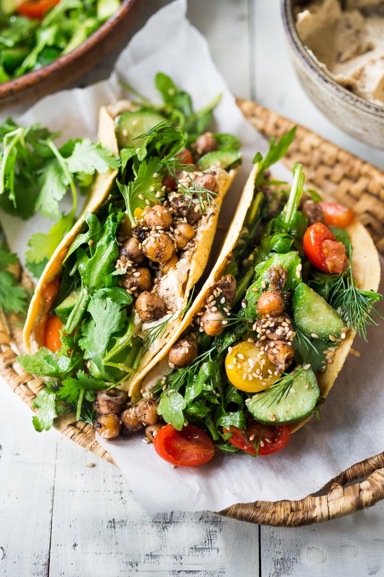 40 Mouthwatering Vegan Dinner Recipes!| Middle Eastern Salad Tacos with spiced chickpeas, hummus and a mound of lemony salad, topped with fresh herbs and scallions. Vegan & sooooo Delicious! | #plantbased #cleaneating #saladtacos #detox #veganrecipes #eatclean #healthy #healthyrecipes #healthylunchideas #tacos #vegantacos |www.feastingathome.com