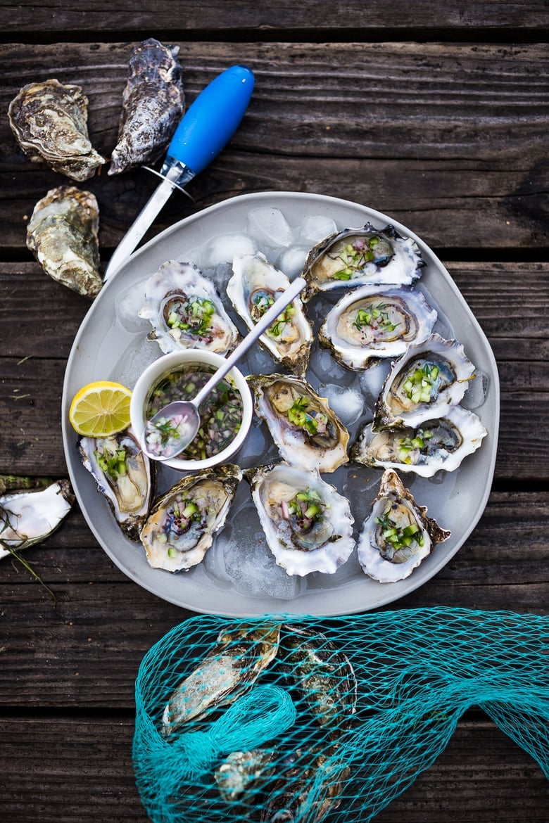 Fresh Oysters with Mustard Seed Mignonette with cucumber, shallot and dill. | #oysters #appetizers #partyappetizers www.feastingathome.com