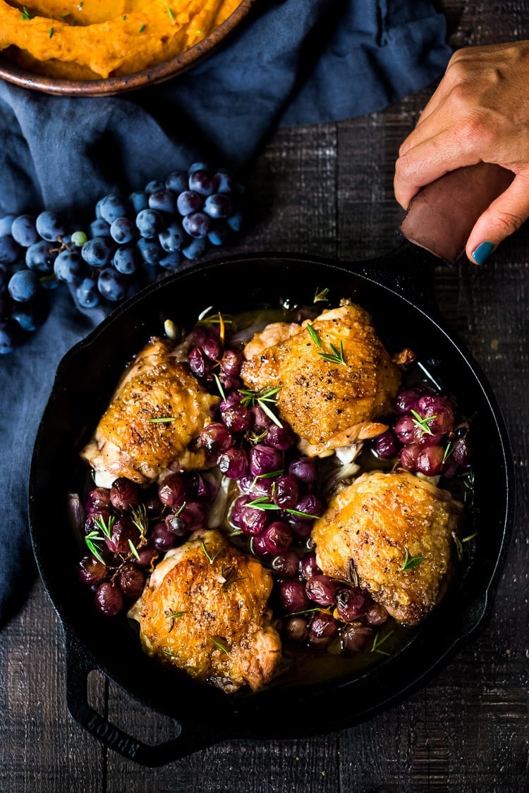 Our Best Fall Recipes! |Rosemary Chicken Thighs with Roasted Grapes and Shallots, served over Whipped Ginger Sweet Potatoes - a simple, easy, fall-inspired skillet dinner that can be made in 30 minutes!  #rosemarychicken #skilletchicken #bakedchicken #roastedgrapes #chicken #chickenthighs 