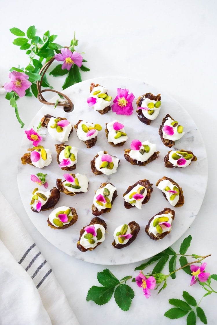 25 Appetizers to Bring to a Party! (That are not boring) Stuffed Dates with Pistachios- and your choice or rose petals ( in Summer) or pomegranate seeds (in winter)- a simple easy appetizer to bring to your party, that can be made ahead!