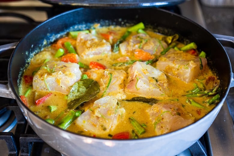 add the fish, and let it simmer gently 